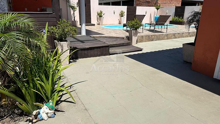 CASA 3 DORMITORIOS COM PISCINA  E KIOSQUE 24