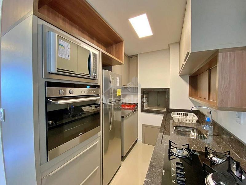 Localizado na mais bela praia ga�cha, a poucos metros da Praia Grande.  Apartamento com 01 dor 10