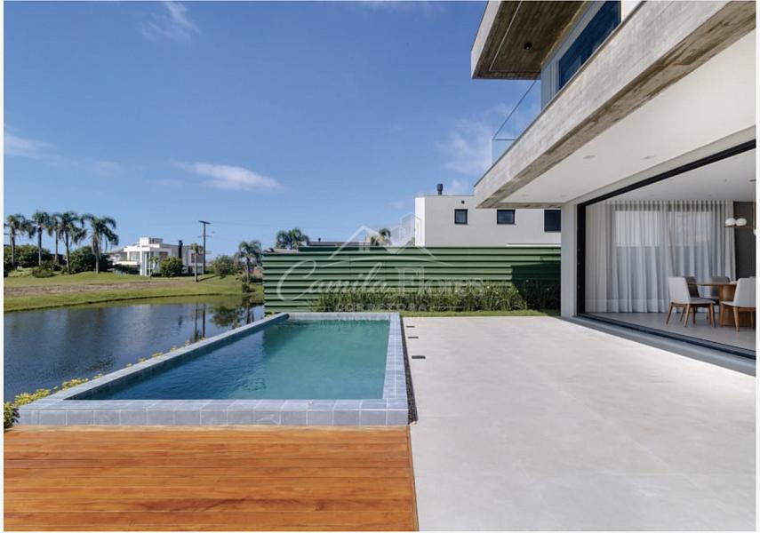 Sobrado � venda 4 Suites sendo 1terrea no condom�nio Ilhas ParkTorres/RS 9
