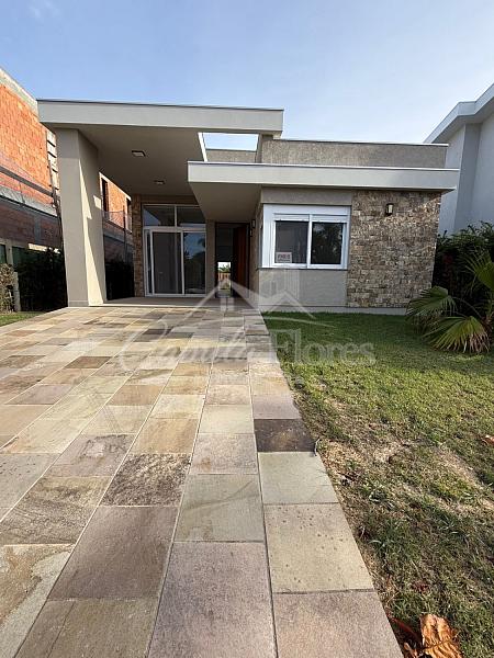 Casa � venda 4 Suites no condom�nio Ilhas Park Torres/RS 1