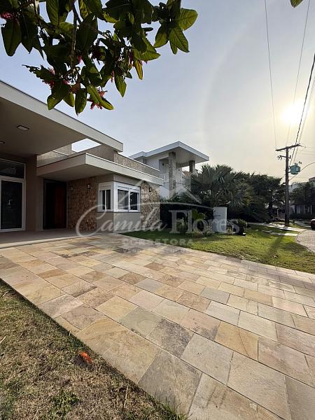 Casa � venda 4 Suites no condom�nio Ilhas Park Torres/RS 2