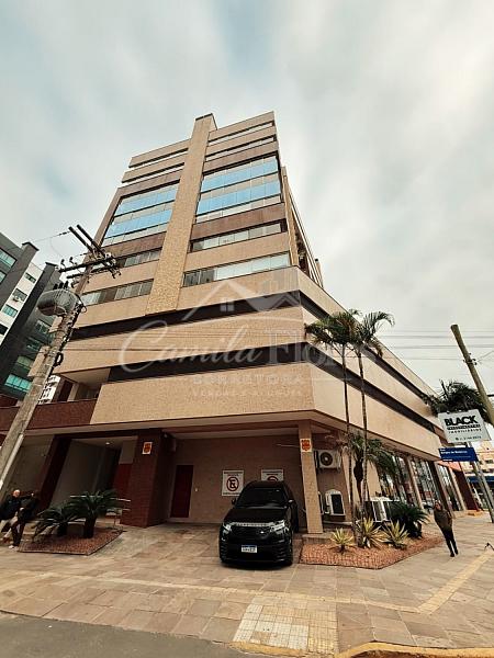 Apartamento 2 dormitorios, sendo 1 suite no centro de Torres/RS 1