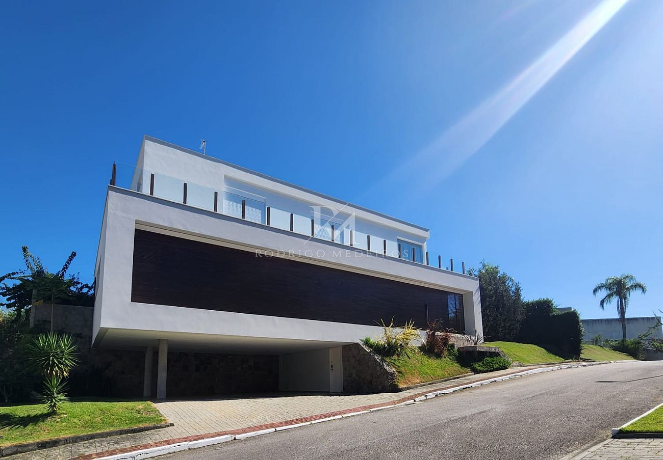 Casa 4 suítes à venda em condomínio no Cacupé, Florianópolis/SC