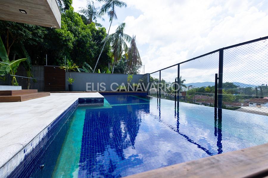 Casa exclusiva com 670m² e piscina de borda infinita no América — foto 4