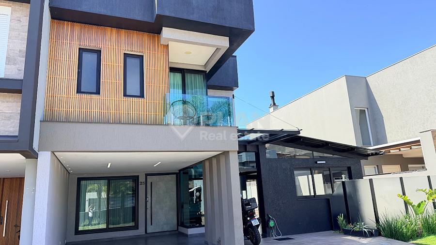Casa em dois terrenos no Reserva Ecoville | 4 su�tes, mobiliada e com piscina 1