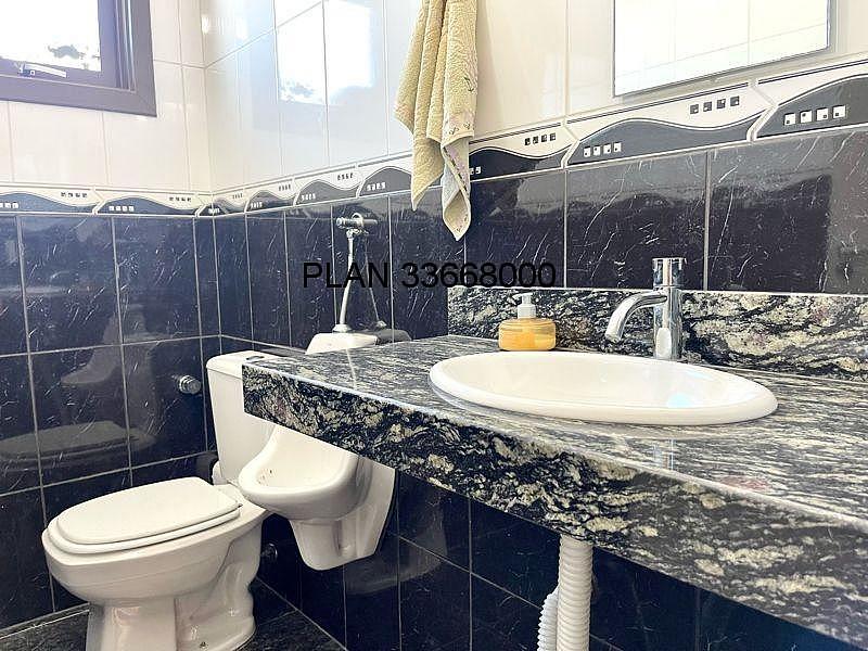 Casa na Avenida Ecoville em Condom�nio com Infra com 04 dormit�rios sendo duas su�tes. 61