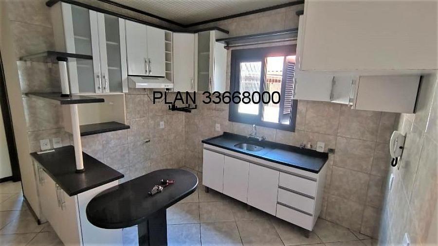 Excelente casa t�rrea com um p�tio amplo. 18