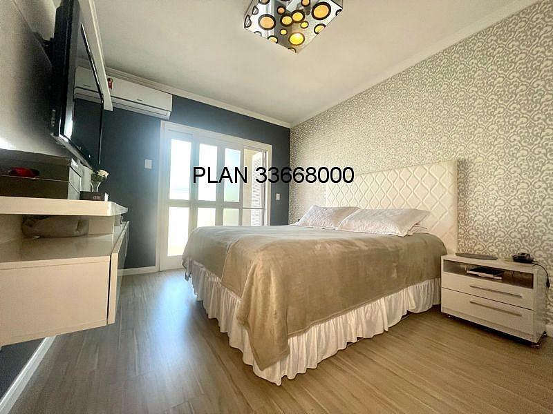 03 dormit�rios, sendo uma su�te master com banheira de hidromassagem, uma su�te americana + um quarto. 38