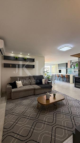 Living do apartamento do Paradiso Residence no Centro em Itapema