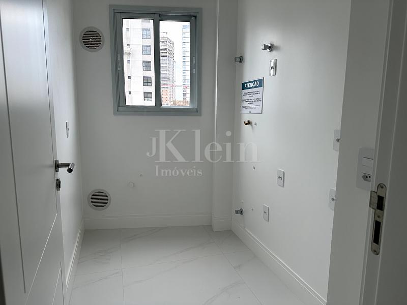 �rea de servi�o do apartamento no San Lorenzo no Centro em Itapema