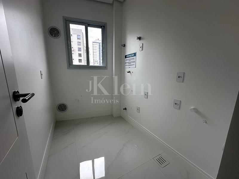 �rea de servi�o do apartamento no San Lorenzo no Centro em Itapema