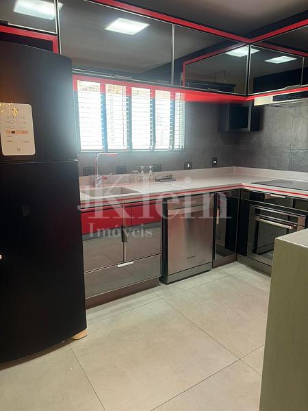 Cozinha do apartamento do Tahiti Residencial em Itapema