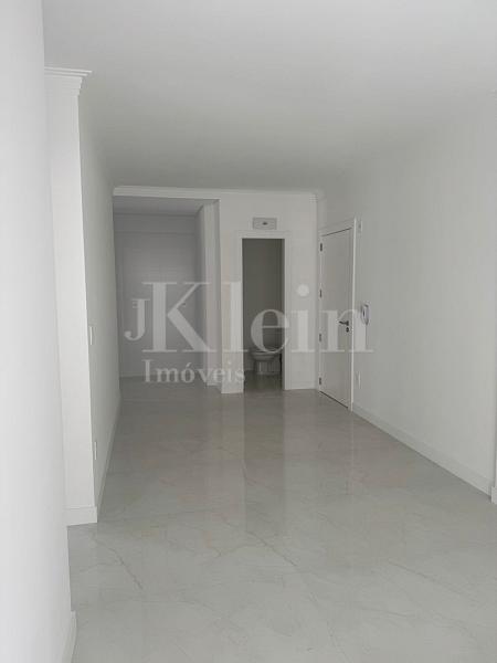 Living do apartamento do Alexandrita Residencial em Itapema