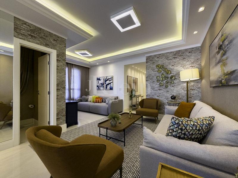 Living do apartamento no Le Lis Blanc Residence em Itapema