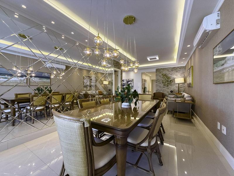 Living do apartamento no Le Lis Blanc Residence em Itapema